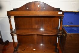 A Victorian whatnot wall shelf in mahogany