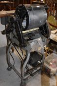 An industrial Adana letter type set printing press motorised unsure of model number