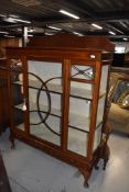 An Edwardian mahogany and inlaid display cabinet, width approx. 123cm