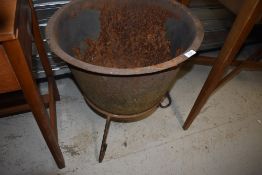An Antique boiling/melting pot, would work as a firepit/barbeque