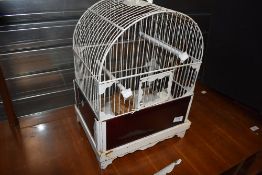 A small vintage birdcage