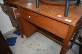 A vintage teak desk/dressing table