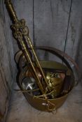 A selection of brass and copper wares including jam pan