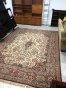 A traditional room sized carpet square , approx. 255 x 355cm