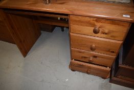 A pine pedestal desk or dressing table, width approx. 108cm