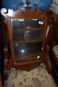 A Chippendale style wall mirror having silver back