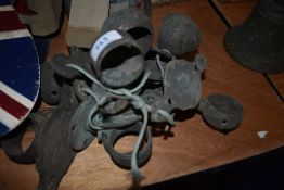 A collection of vintage hand or towel rail brackets or similar.
