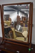 A 19th Century toilet mirror having mahogany frame, height approx. 69cm