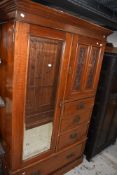 A Victorian mahogany mirror door wardrobe, red stain, width approx 126cm