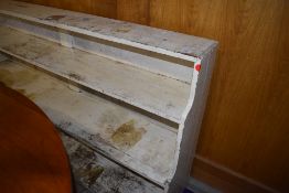 An early 20th century utility or storage shelf in painted pine ideal for stripping 6ft long