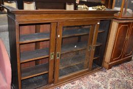 A late 19th or early 20th Century oak bookcase top having sliding glass doors, width approx 158cm