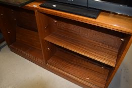 A vintage teak low bookcase