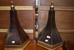 A pair of wall mounted brackets or sconce