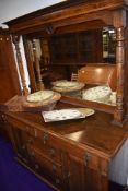 A mirror backed sideboard in oak early 20th century 150cm long