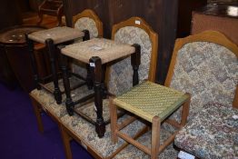 A pair of oak foot stools having woven fibre top