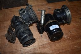 Two carbide bike lamps.