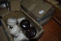 Three boxes of ceramic GEC switches.