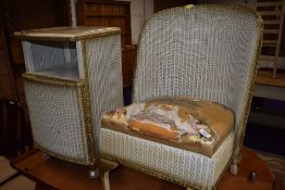 An art deco woven fibre nursing chair and a matching bed side cupboard or stand