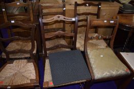 A selection of six dining and salon bedroom chairs in various designs including rush seated and