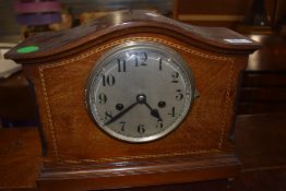 A mahogany cased mantle clock having inlayed banding and chime