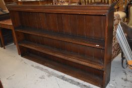 A traditional oak dresser back, width approx 187cm