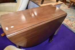 An early 20th Century mahogany gateleg table on cabriole legs