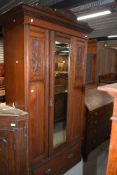 A Victorian mirror door wardrobe