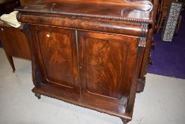 A Victorian buffet bar or side board having flame mahogany frontage with double drawer and under