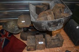 A set of vintage potato scales and a selection of weights.