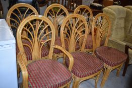 A set of six (four plus two) canework conservatory/dining chairs