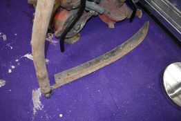 A vintage scythe.