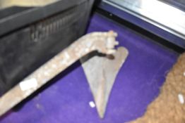 A vintage boat anchor.