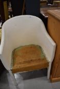 A woven fibre tub chair