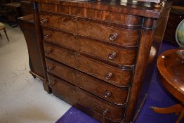A Victorian Scotch chest of five drawers having flame mahogany frontage with oak liners and original