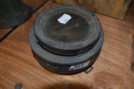 A vintage marine compass.