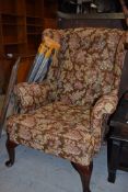 A vintage Parker Knoll wingback armchair, very comfortable!