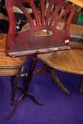A wooden framed music stand