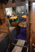A late Victorian hall way mirror backed coat and stick stand