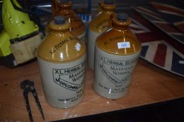 Four earthen ware flagons, of Morecambe, Heysham and Bolton interest.