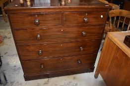 A Victorian mahogany chest of two short over three long drawers