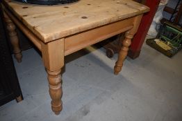 A natural pine square dining table, width approx. 91cm