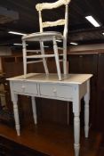A vintage painted pine side or hall table having double drawer set and a matching chair