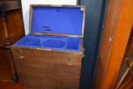 A late Victorian portable decanter or similar case having oak carcass
