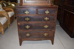 A 19th Century mahogany chest of two over three drawers having Georgian brass handles and line inlay