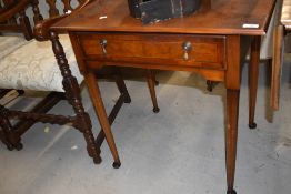 A reproduction mahogany hall table, having frieze drawer, width approx. 70cm