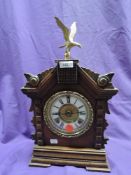 A wood framed mantel clock by Asonia Clock Co, New York with enamel face