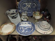 A mixed lots of ceramics including blue and white platter, butter dish and plates and more.