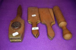 A selection of farm house kitchen items including butter pat's, garlic press and similar