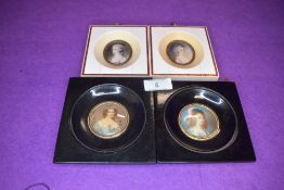 Two hand painted Italian miniature portraits of renaissance ladies in ebonised frames and two