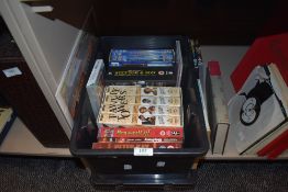 A selection of DVD's video tapes and books including Storeys of Lancaster and repro poster prints